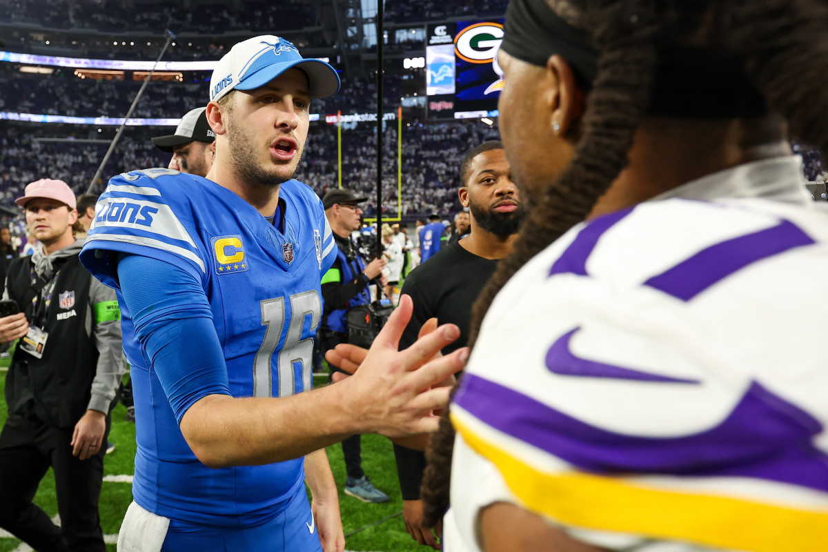 Dec 24, 2023; Minneapolis, Minnesota, USA; Detroit Lions quarterback Jared Goff (16) and Minnesota Vikings wide receiver K.J. Osborn (17) shake hands after the game at U.S. Bank Stadium. With the win the Detroit Lions clinched the NFC North.